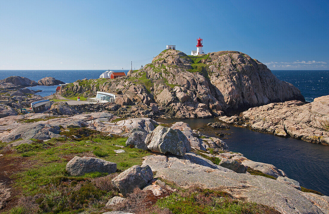 Lighthouse and house on rocks at Kap Lindesnes, Province of Vest-Agder, Soerlandet, Norway, Europe