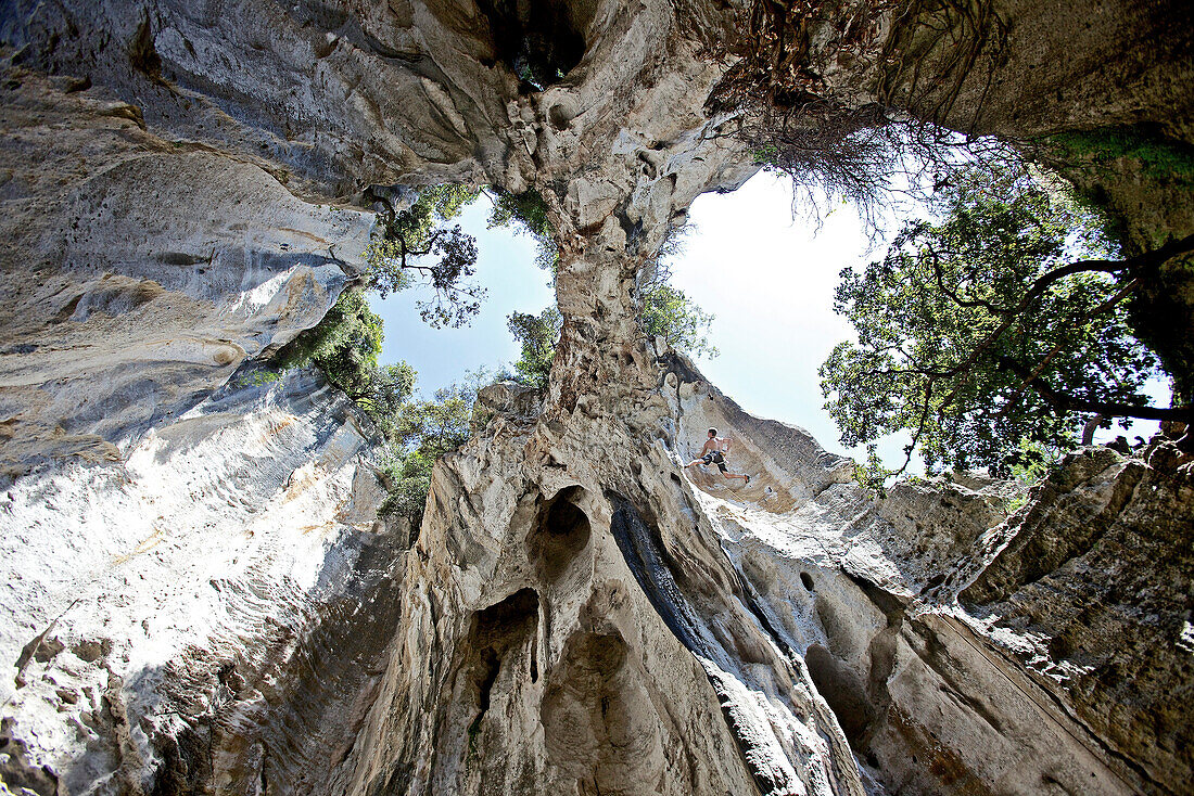 Man rock climbing, Finale Ligure, Province of Savona, Liguria, Italy