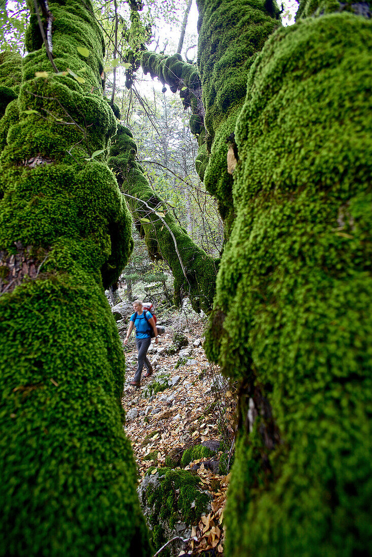 Woman hiking along long-distance footpath Lycian Way, Antalya, Turkey