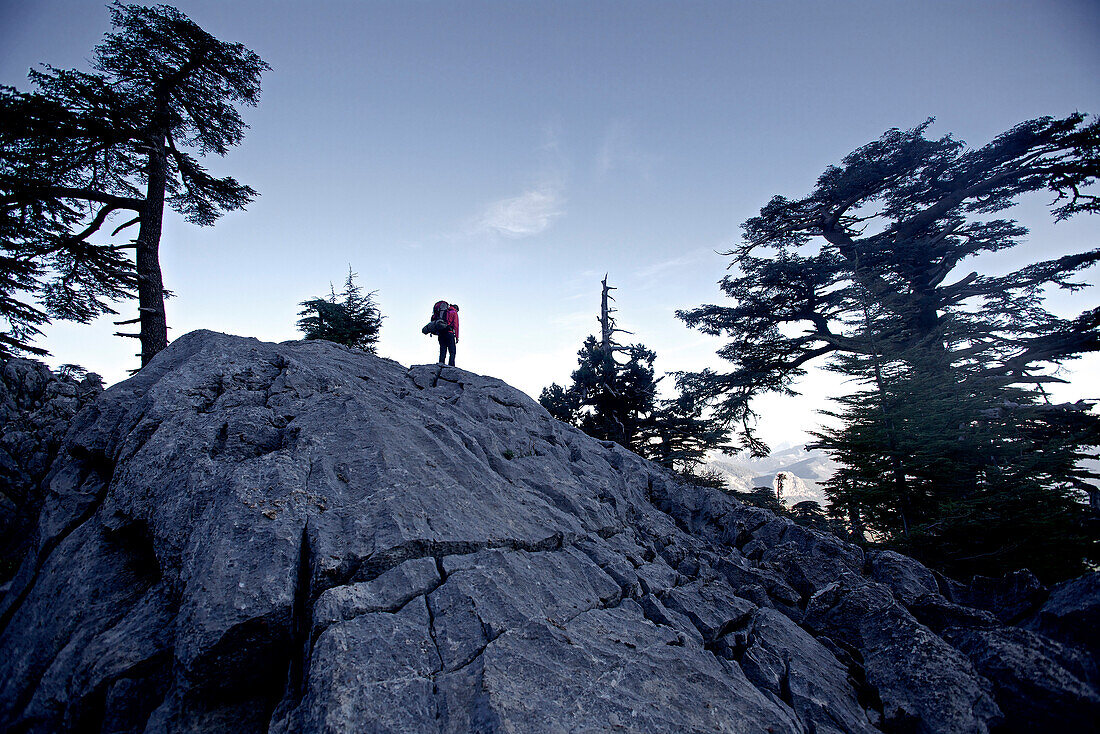 Woman hiking along long-distance footpath Lycian Way, Antalya, Turkey