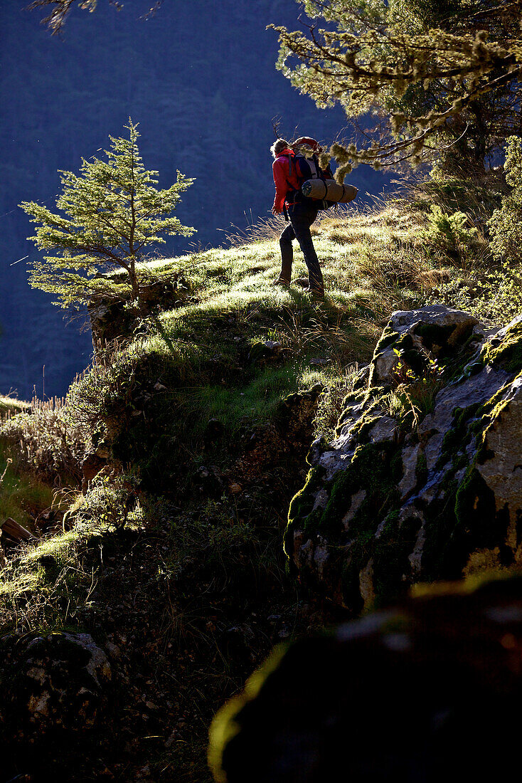 Woman hiking along long-distance footpath Lycian Way, Antalya, Turkey