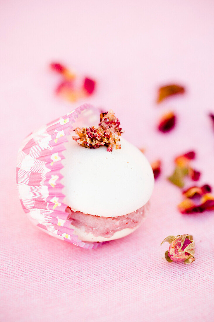 Macaron with candied rose blossoms