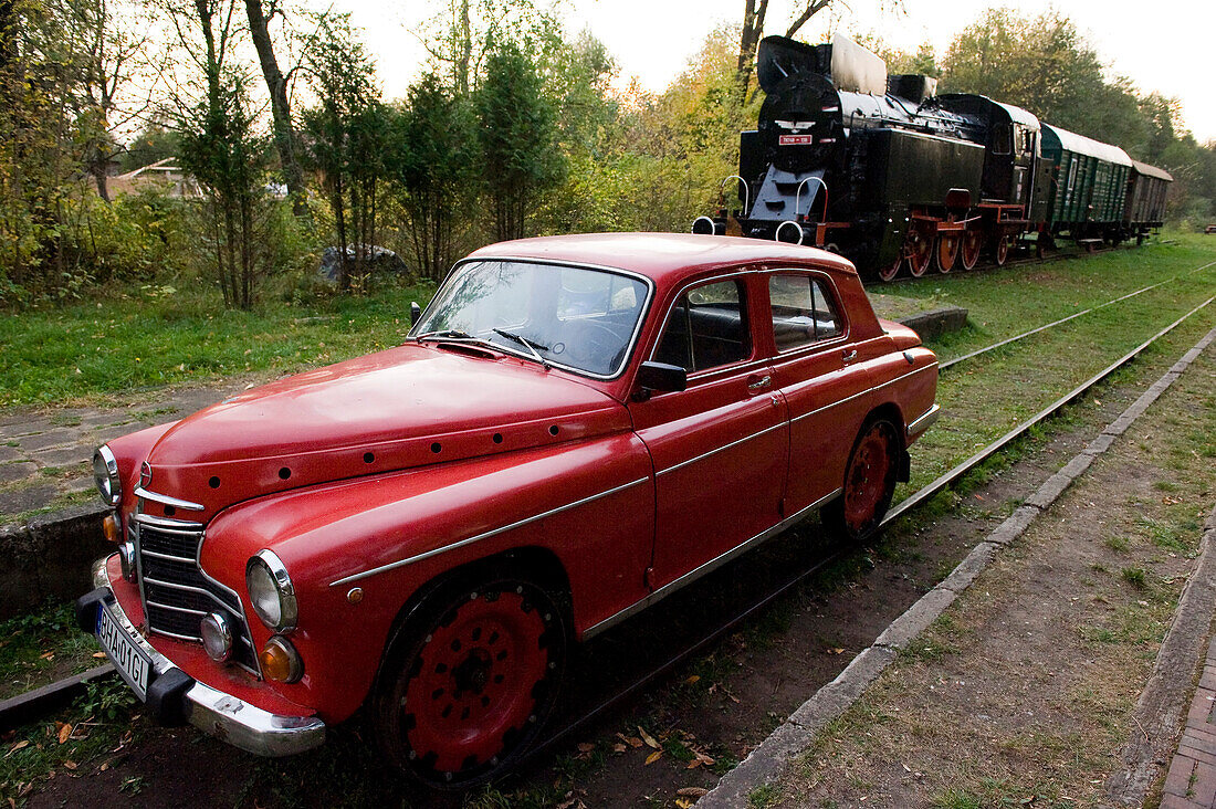 Car and steam locomotive, Bialowieza National Park, Podlaskie Voivodeship, Poland