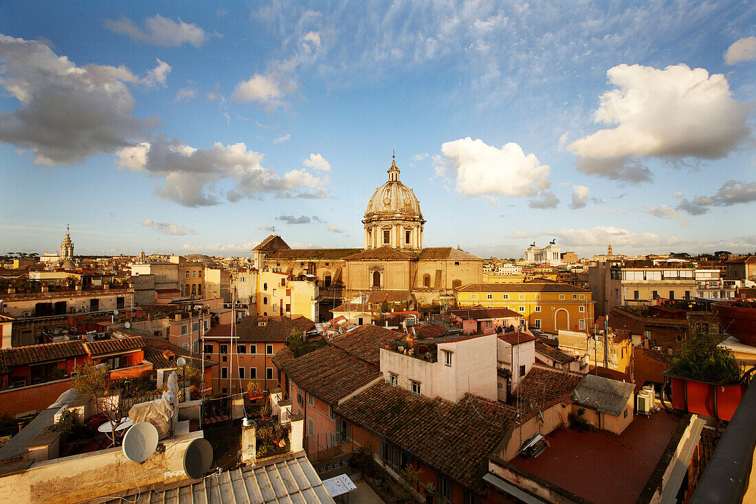 View from Hotel de Fiori over the roofs of Rome towards the dome of St. Peters, Rome, Latio, Italy
