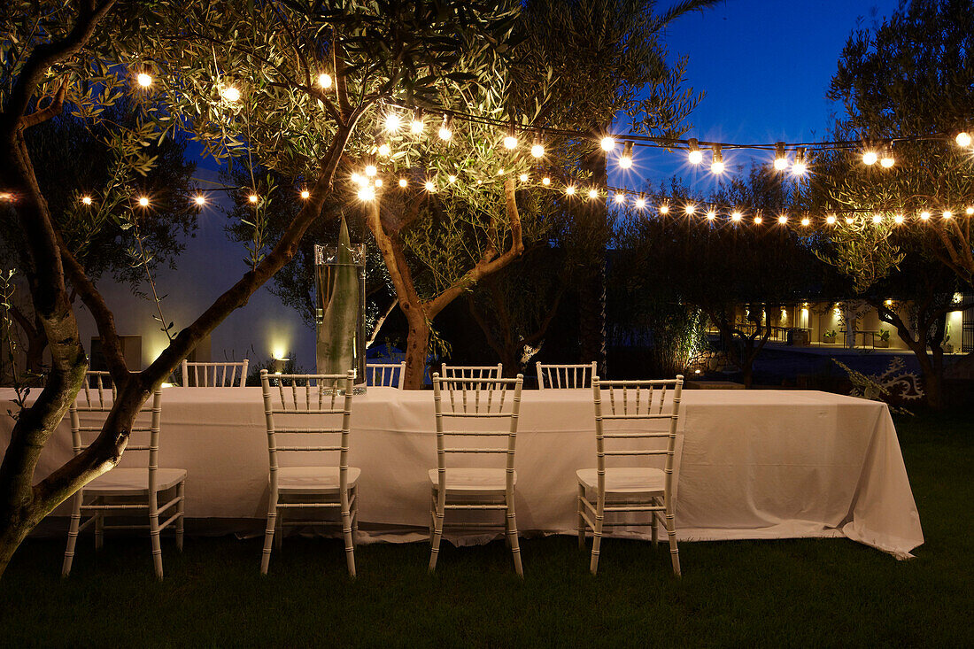 Set table in the evening light, Masseria, Alchimia, Apulia, Italy