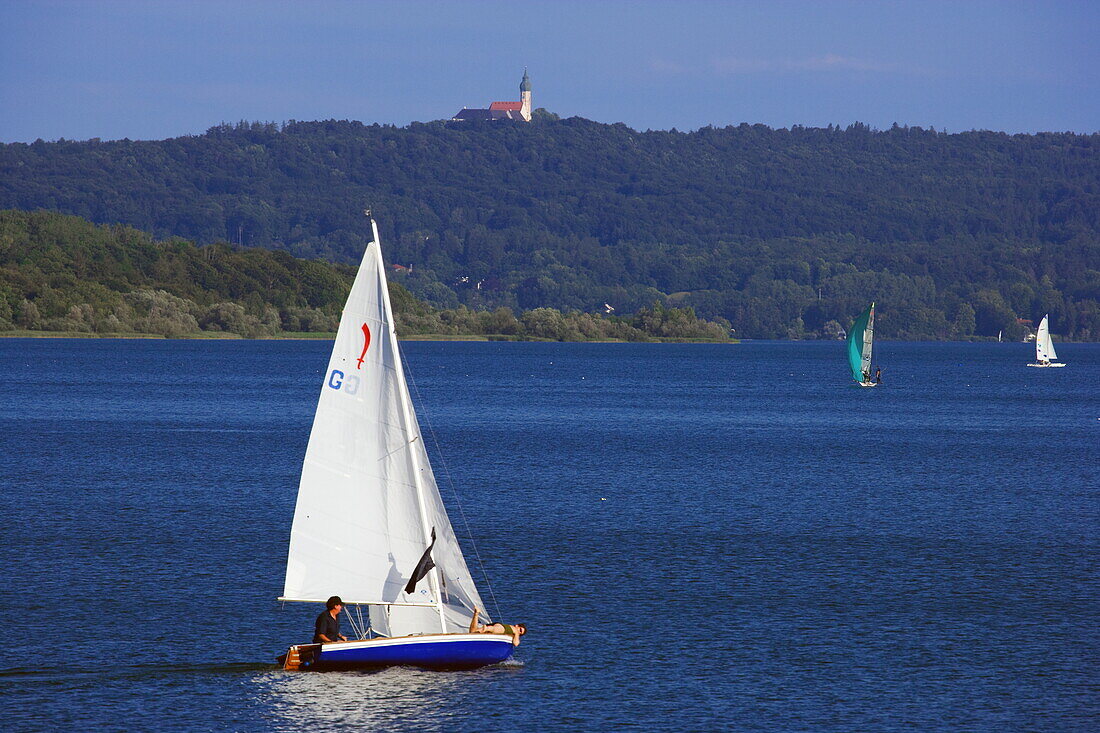 Sailing boat and Andechs monastery in the background, Ammersee, Upper Bavaria, Bavaria, Germany