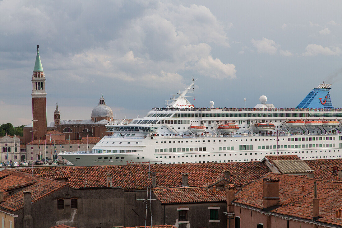 Cruise ship protest, Cruise ship towering above the roofs in the Giudecca Canal, Venice, Veneto, Italy