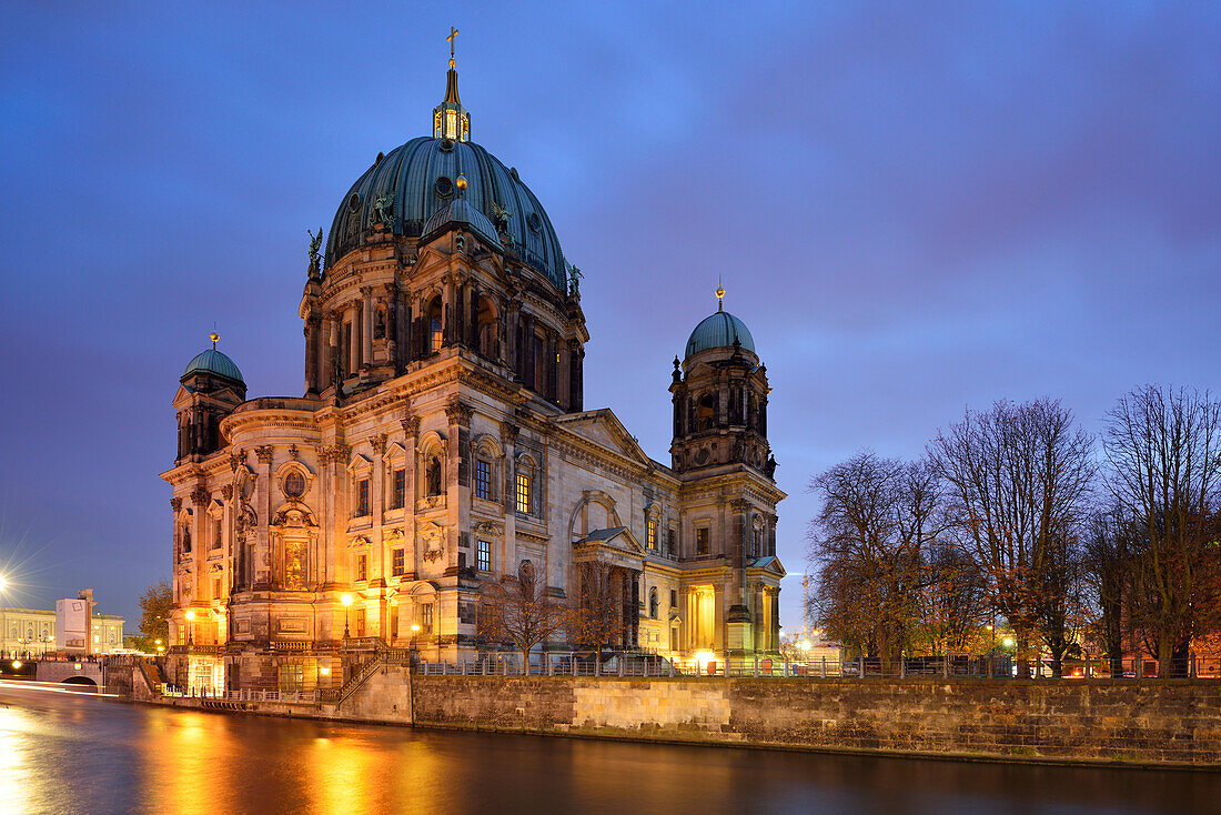 Illuminated Berlin cathedral above the river Spree, Berlin, Germany