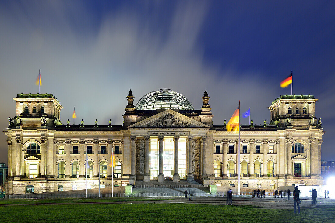 Illuminated building of German Reichstag in the evening, Berlin, Germany