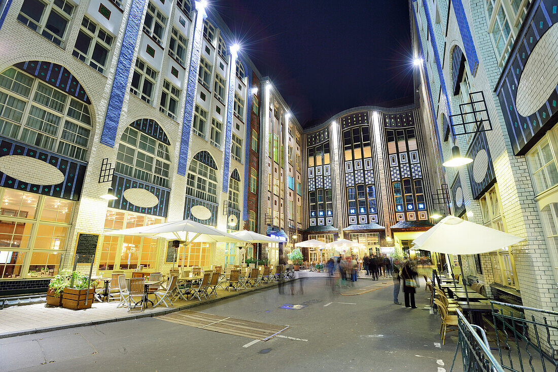 Illuminated atrium Hackesche Hoefe at night, Berlin, Germany