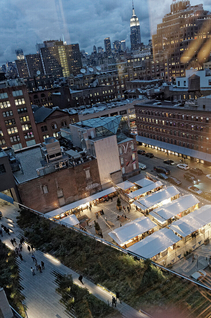 View from Standard Hotel to Meat Packing District, High Line, Chelsea, Empire State building in the background, New York City, USA