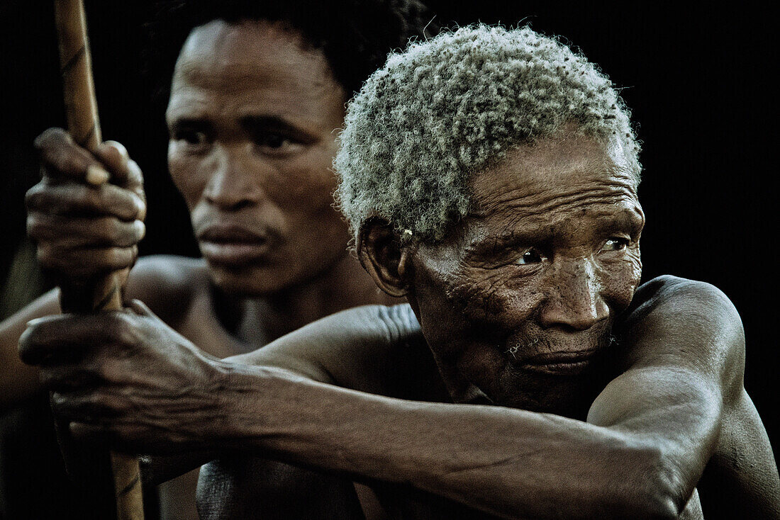 Old and young men from the San tribe, Otjozondjupa region, Namibia, Africa