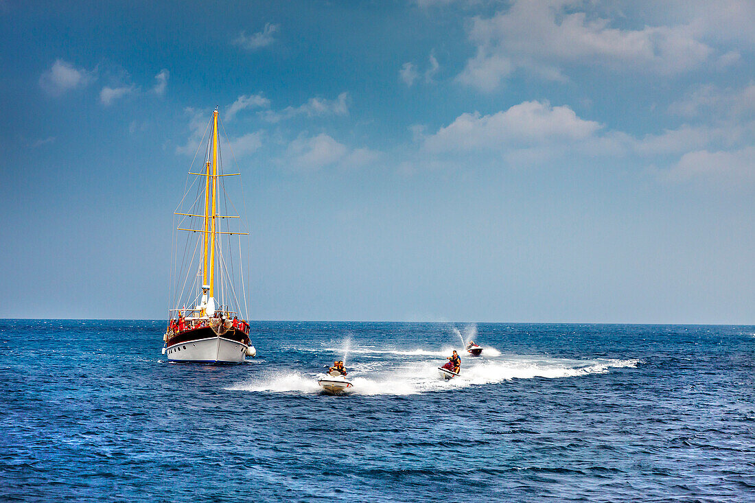 Sailing boat and scooter on the sea, Malta