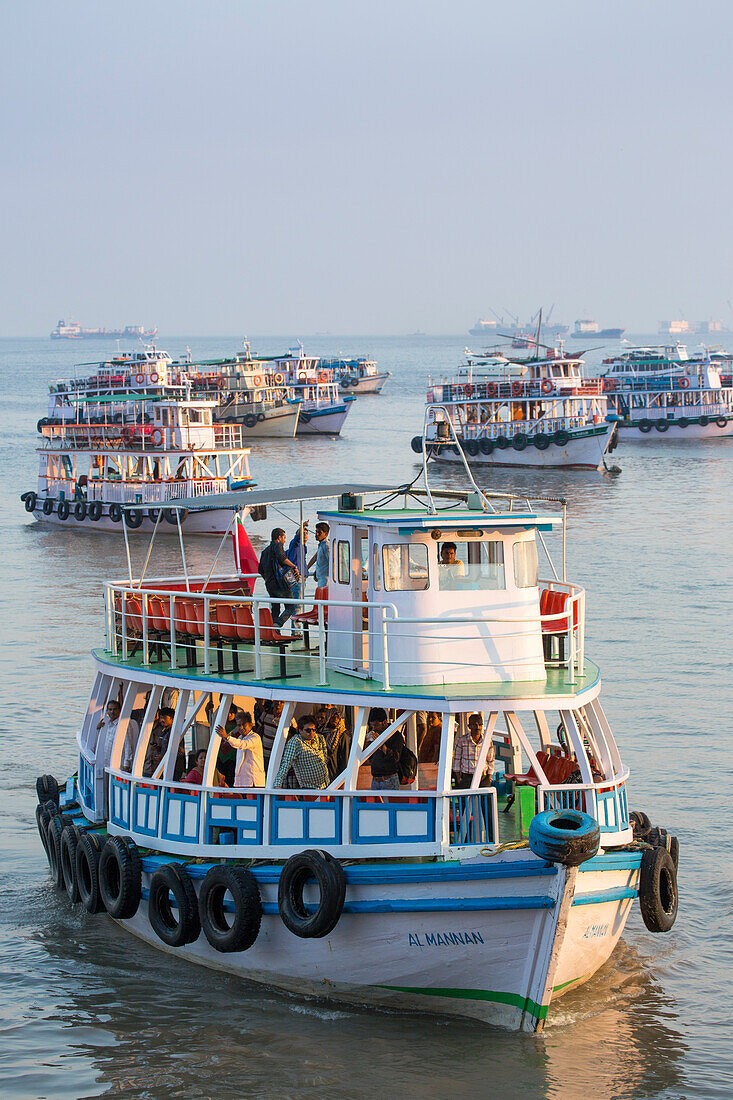 Tour boats in the harbor near the Gateway to India, Mumbai, Maharashtra, India