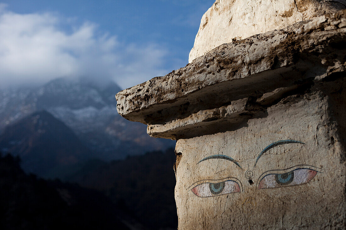 The eyes of a trail side stupa keep watch over travelers in Nepal Solukhumbu Region, Nepal
