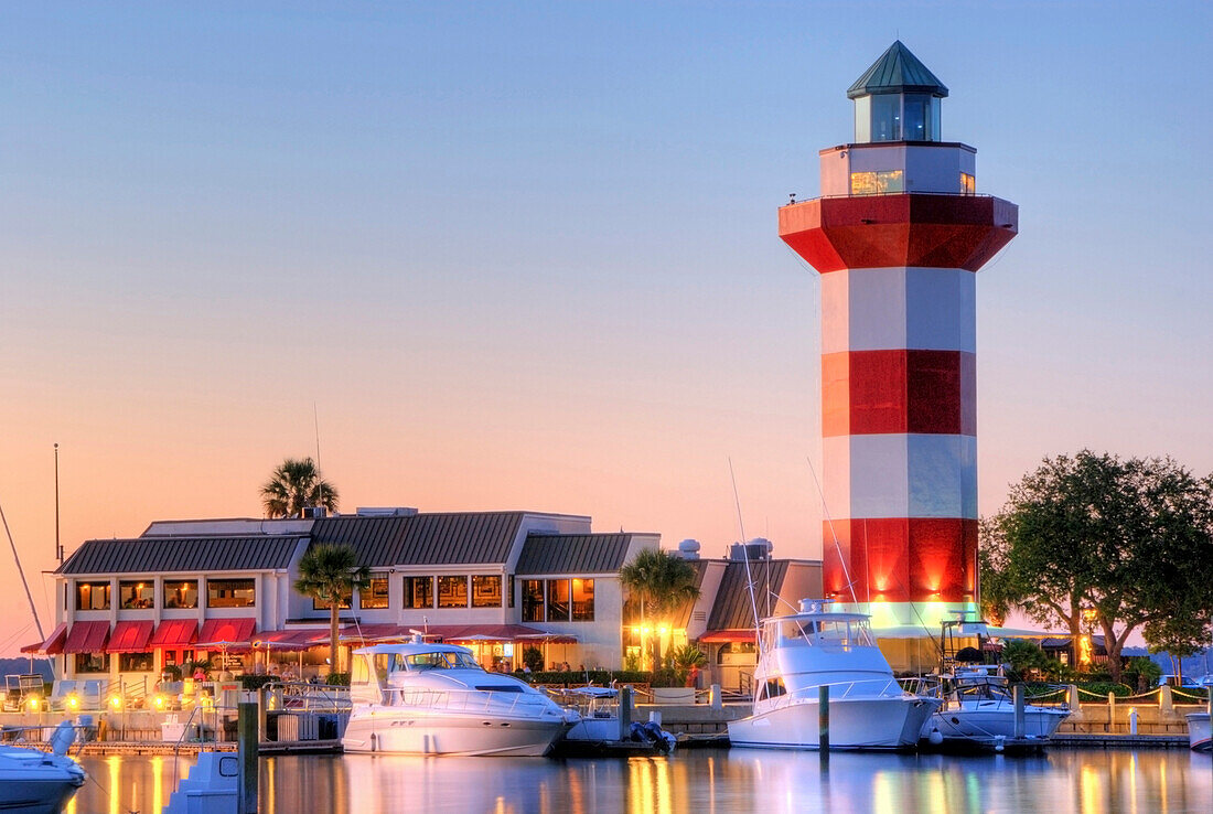 The famous Harbour Town Lighthouse at dusk on Hilton Head Island, South Carolina Hilton Head Island, South Carolina, USA
