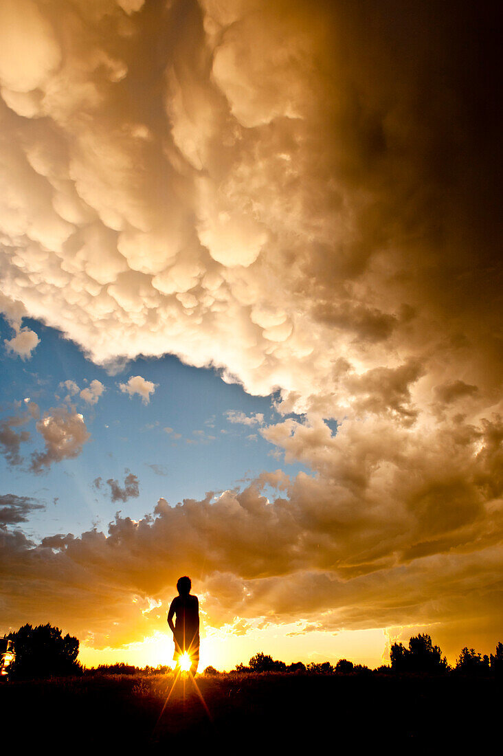 A person standing under an amazing cloud formation.  La Junta, Colorado La Junta, Colorado, United States