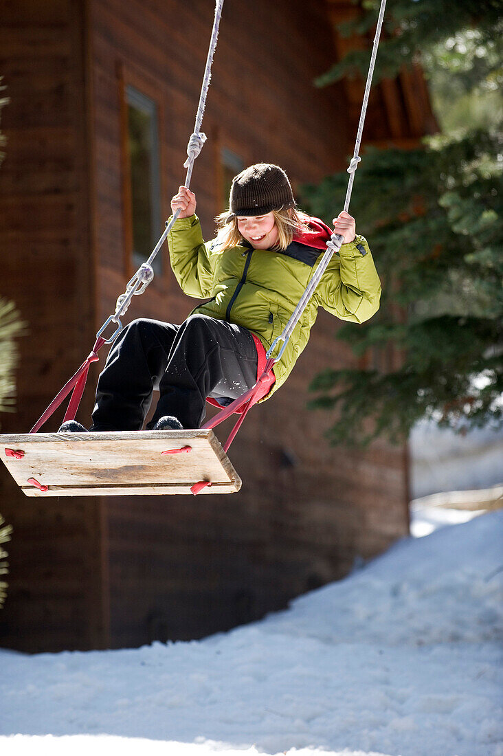 A boy plays outside in Lake Tahoe, California Truckee, CA, USA