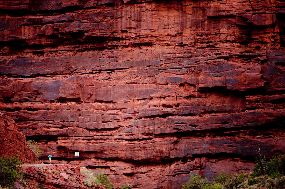 Female runner on a trail near Arches National Park Moab, Utah, USA