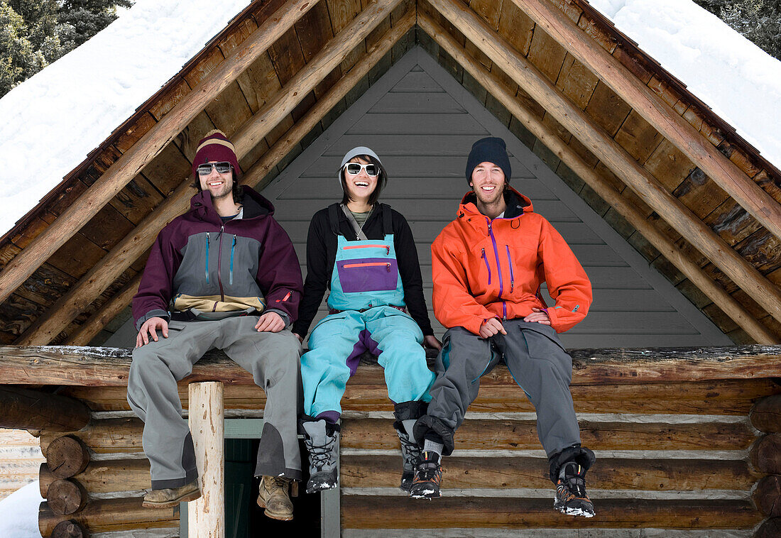 Three young adults at a cabin MT, USA