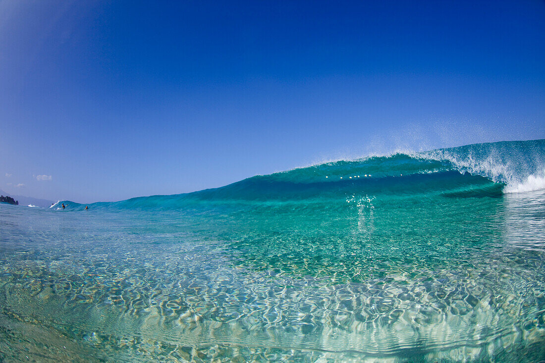 A water view of a tubing wave at Ehukai beach park north shore of Oahu, Hawaii, USA