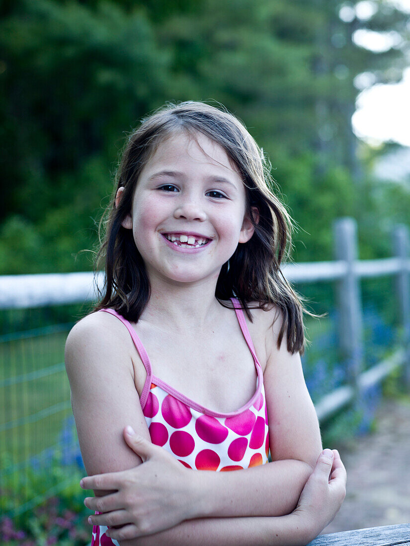 a happy girl in her bathing suit, Portland, Maine, USA