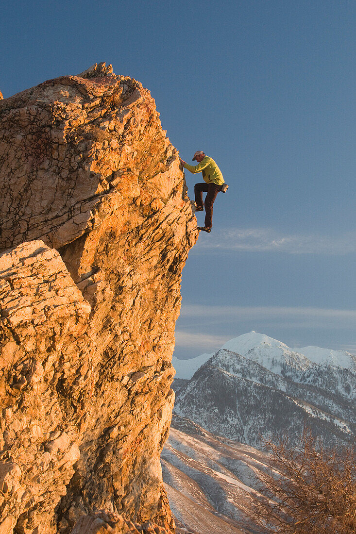 A man rock climbing up a steep climb, Salt Lake City, Utah., Salt Lake City, Utah, usa