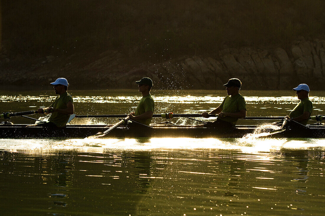 The Lake Casitas Men's Rowing Team works on some drills at Lake Casitas in Ojai, California., Ojai, California, United States of America