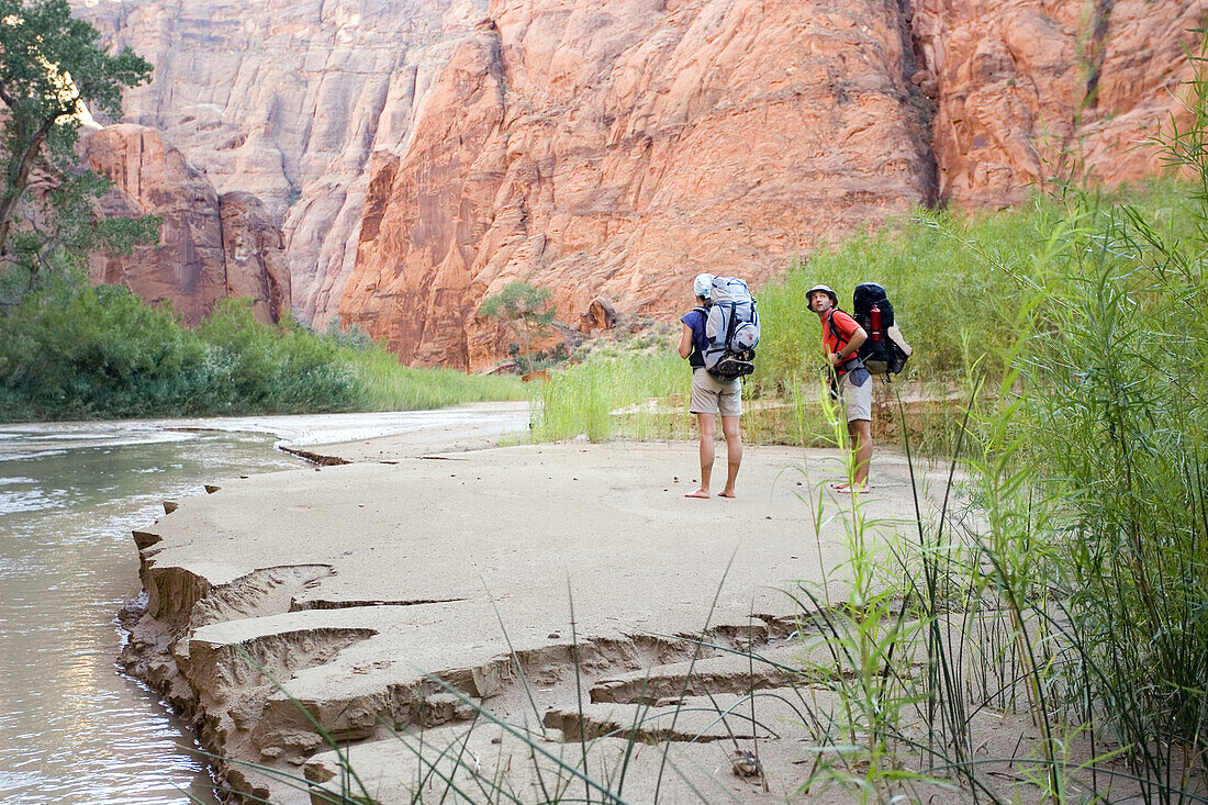 Two hikers in a canyon in Utah, USA Paria Canyon, Utah / Arizona, United States
