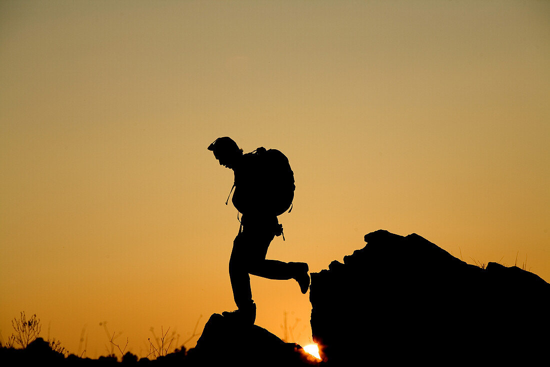 Man hikes in California foothills Pilot Hill, California, United States