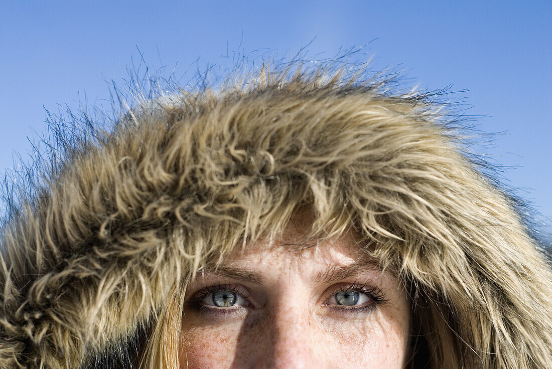 Woman outside wearing furry hood Scarborough, Maine, United States