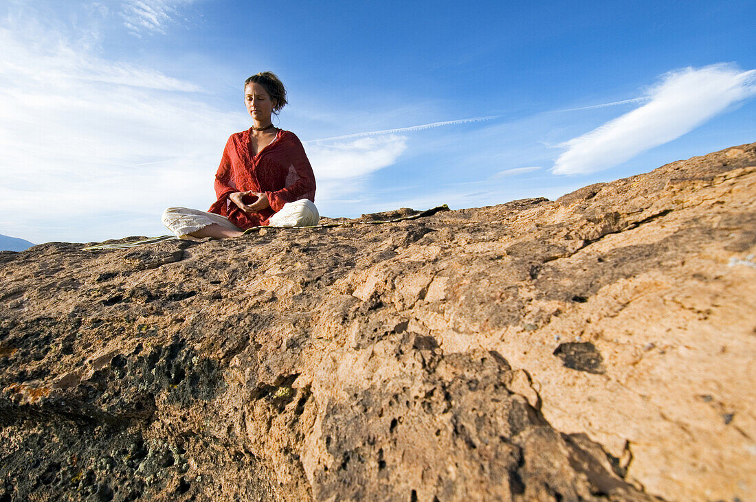 Yoga on volcanic tablelands Bishop, California, United States
