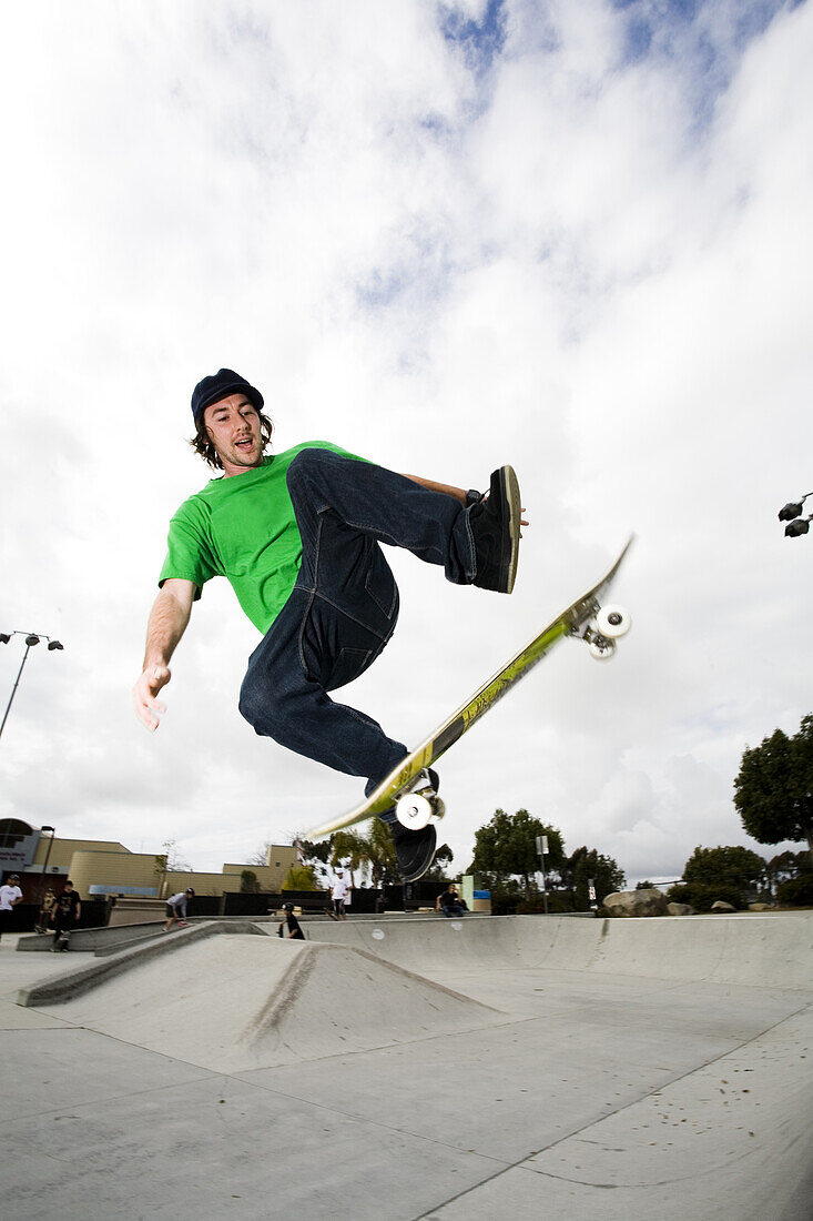 A skateboarder does a trick in mid air Carlsbad, California, United States
