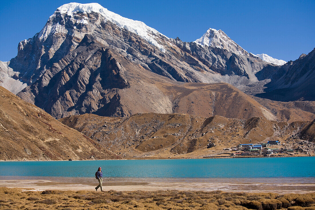 A woman hiking near Gokyo Lake, Khumbu region, Nepal Khumbu, Nepal