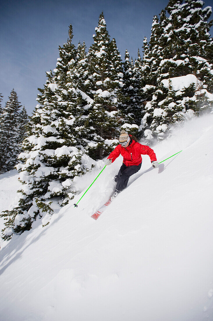 Woman skiing in Breckenridge, Colorado Breckenridge, Colorado, USA