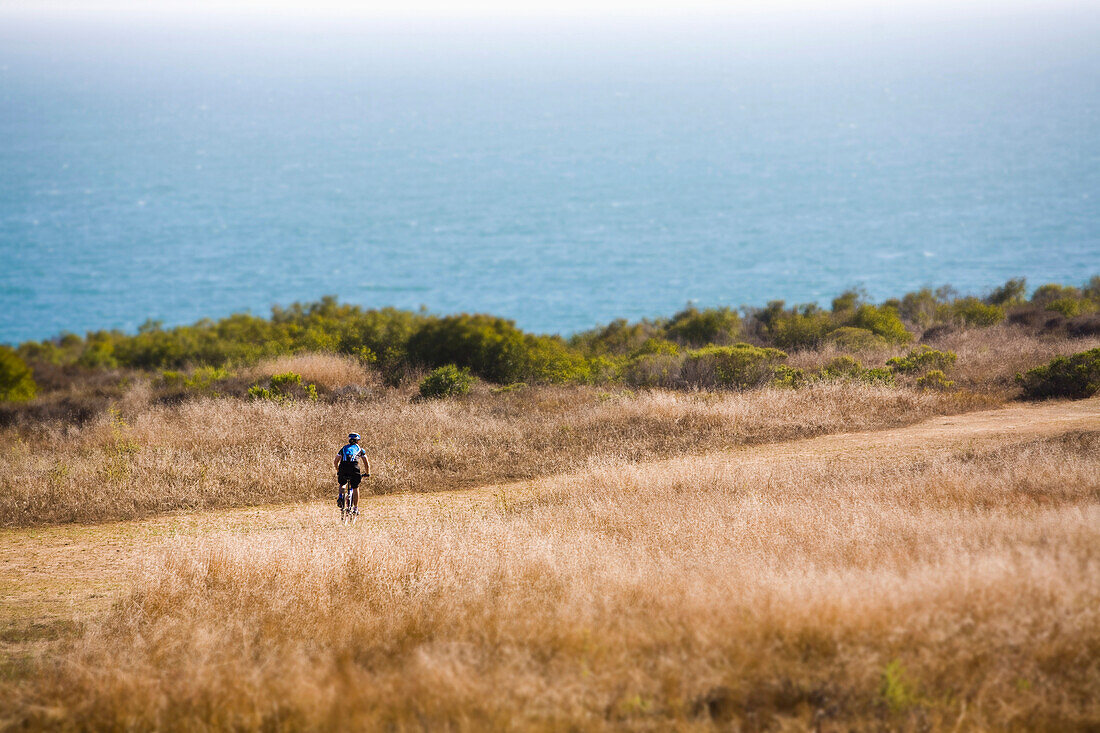 Mountain biking in a seaside park in Malibu, California Malibu, California, USA