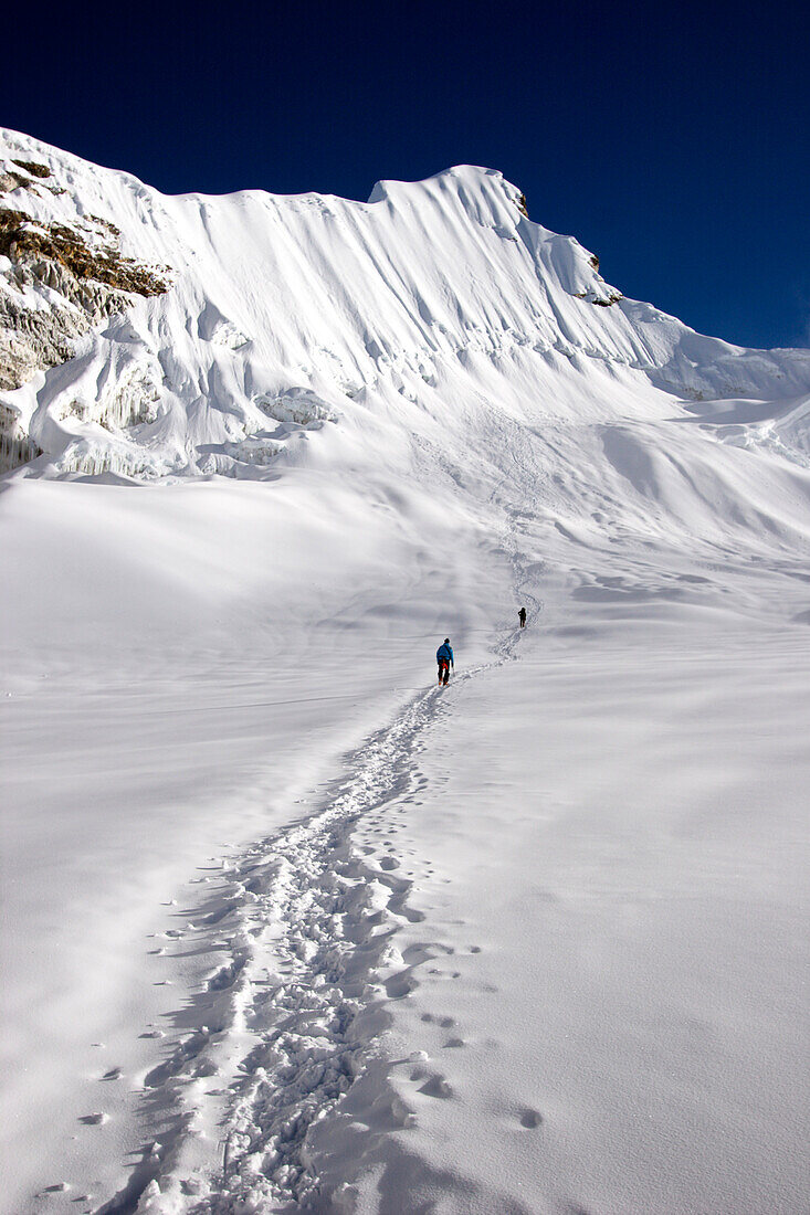 Two climbers near the top of 6000 meter Island Peak in Nepal Khumbu Himalaya, Nepal