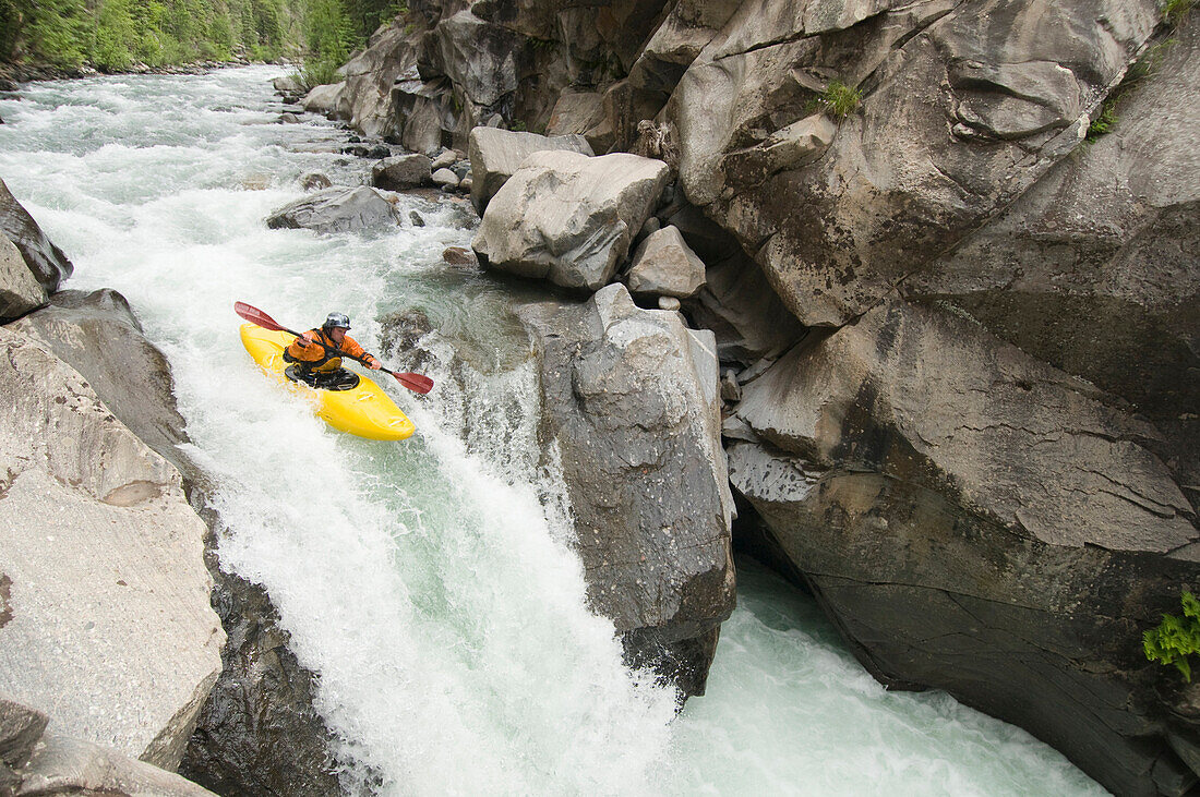 A kayaker descending Vallecito Creek in the San Juan National Forest, Durango, Colorado Durango, Colorado, USA