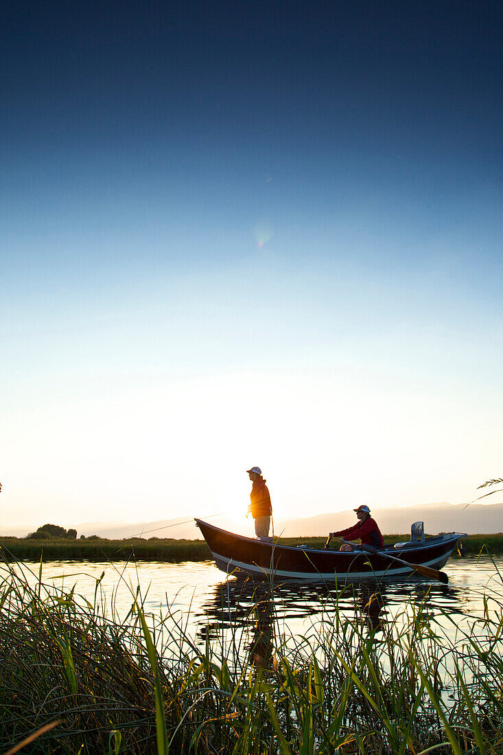 Two men fish the Teton River near Driggs, Idaho Driggs, Idaho, USA