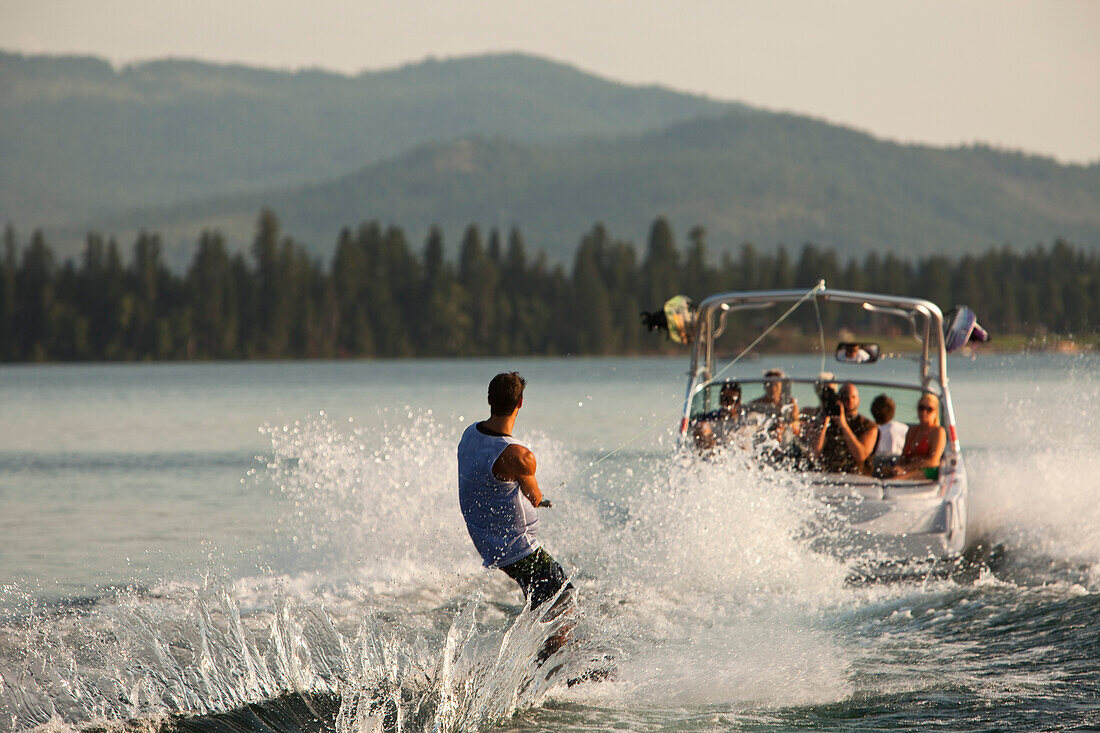 Young man wakeboarding in Idaho Sandpoint, Idaho, USA