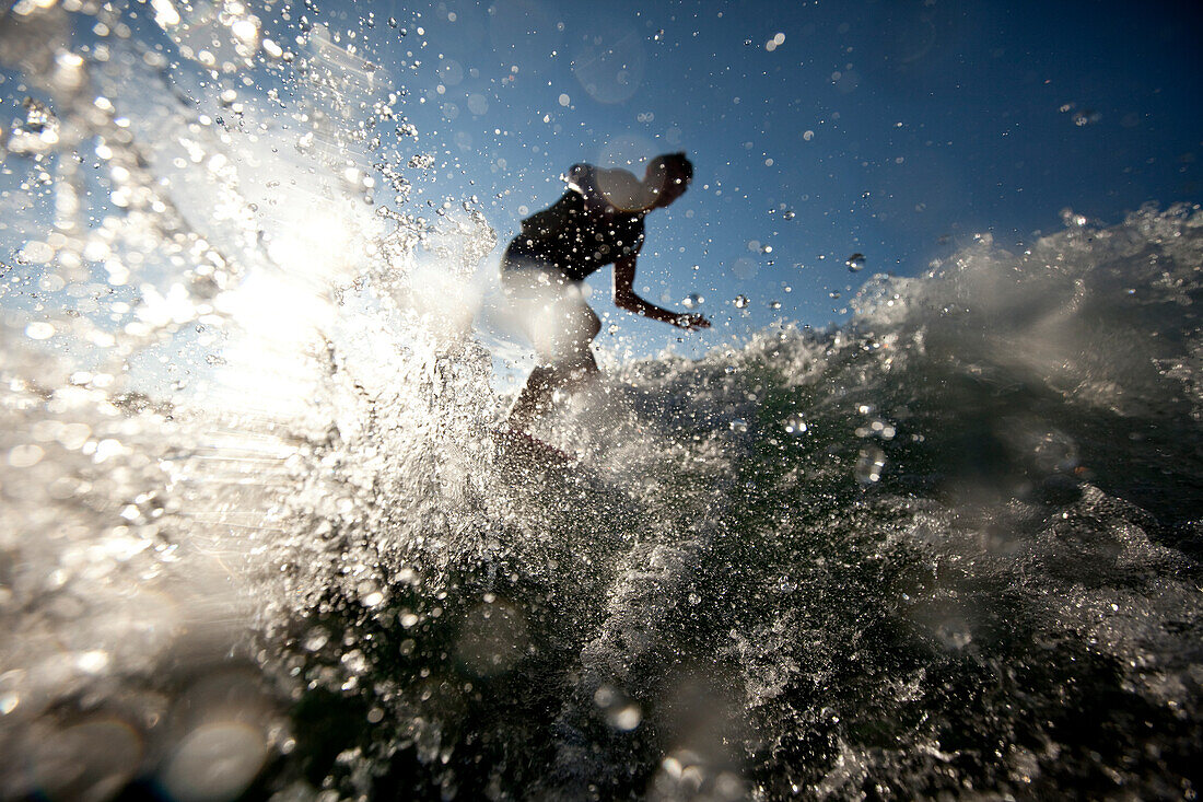 Male wakesurfing in Idaho Sandpoint, Idaho, USA