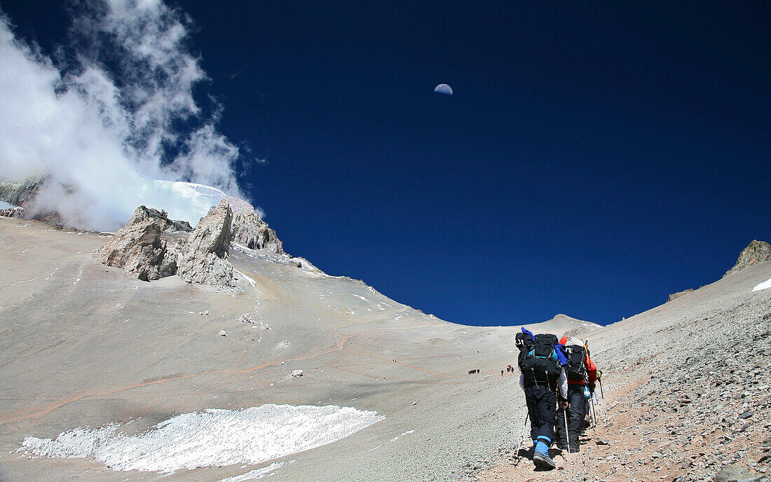 Guided mountaineering team making a carry up to High Camp on Aconcagua, Andes Mountains, Argentina, Mendoza, Andes Mountains, Argentina