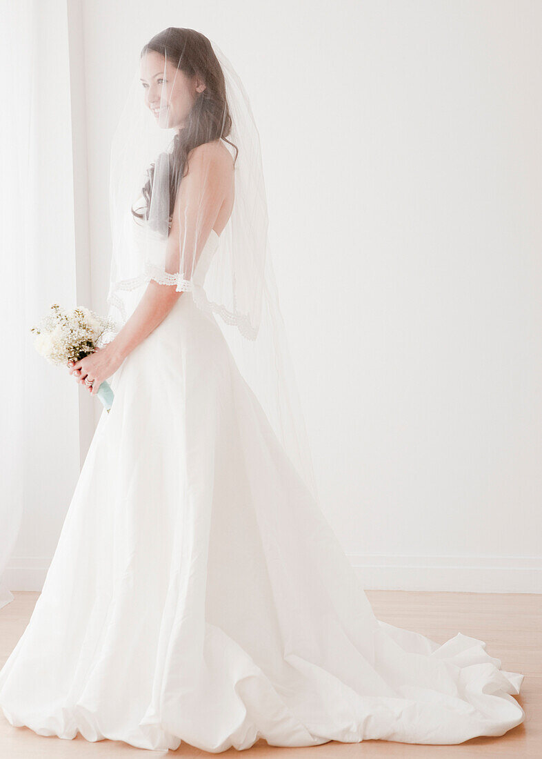 Mixed race bride in wedding dress, Jersey City, NJ