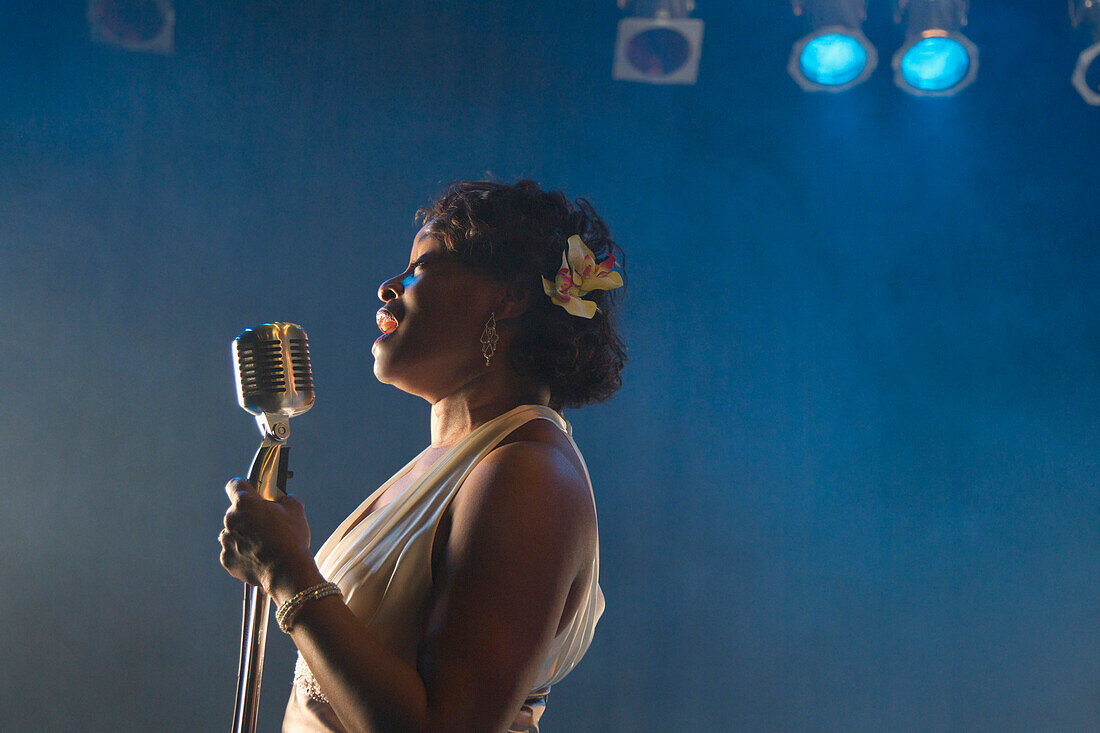 Black woman singing on stage, Rockville, Maryland, USA