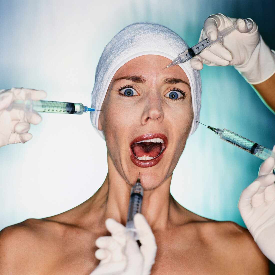 Mixed race woman having facial injections, Potomac, Maryland, USA