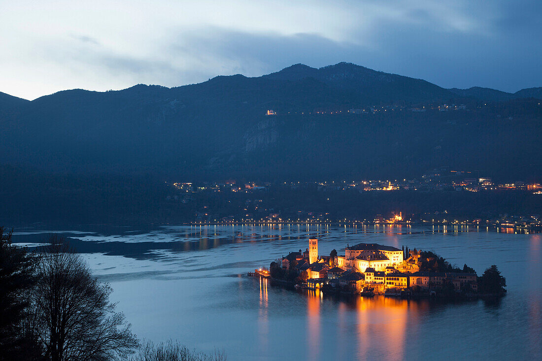 Illuminated island in Italian lake, Orta San Giulio, Novara, Italy