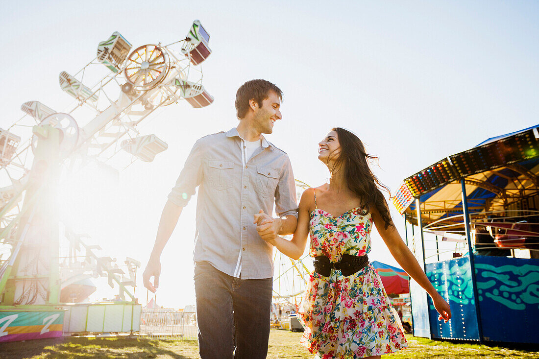 Caucasian couple enjoying carnival, Salt Lake City, Utah, USA