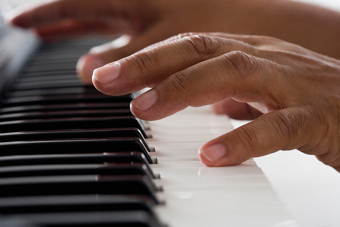 Close up of hands playing piano, Unknown