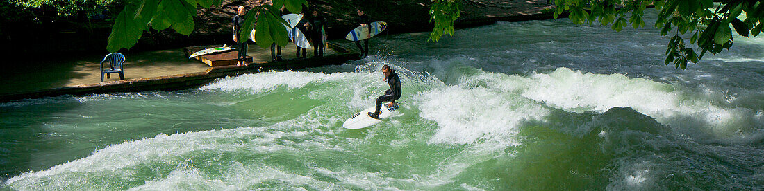 Surfer on the Eisbach river, Munich, Upper Bavaria, Bavaria, Germany