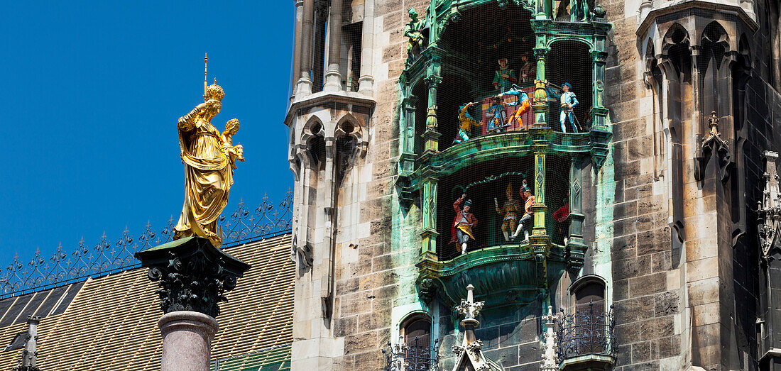 St. Mary's column, Mariensaeule on Marienplatz square with town hall chimes, Munich, Upper Bavaria, Bavaria, Germany